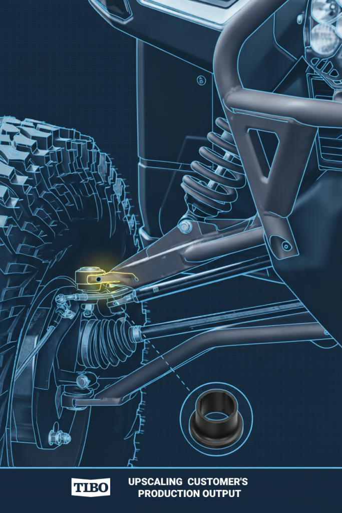 Illustration of an off-road vehicle suspension showing the placement of a molded bushing component.